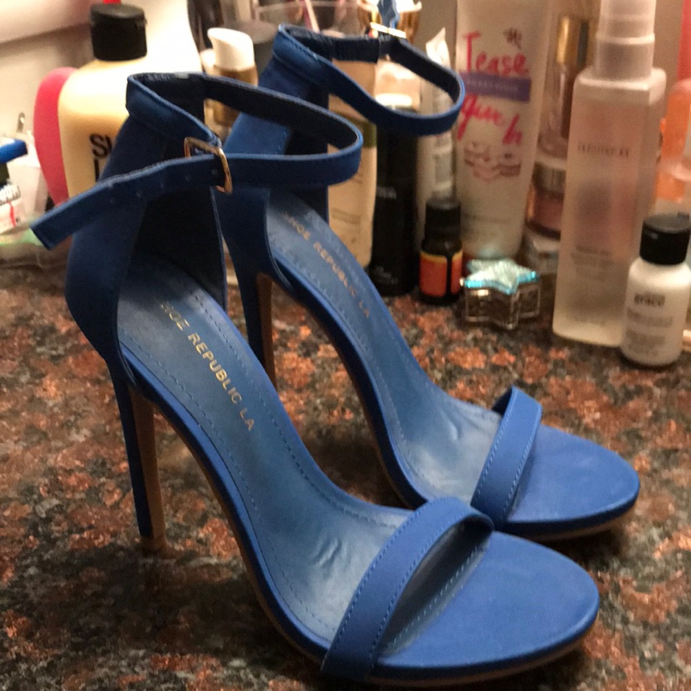 Brand new never worn besides trying on. Royal blue